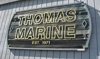 Thomas Marine, Inc. Logo