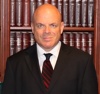 The Law Offices of Greg Prosmushkin, P.C. Logo