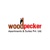Woodpecker Service Apartments Logotype