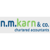 N M KARN & CO Logotype