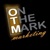 On The Mark Marketing, LLC Logotype